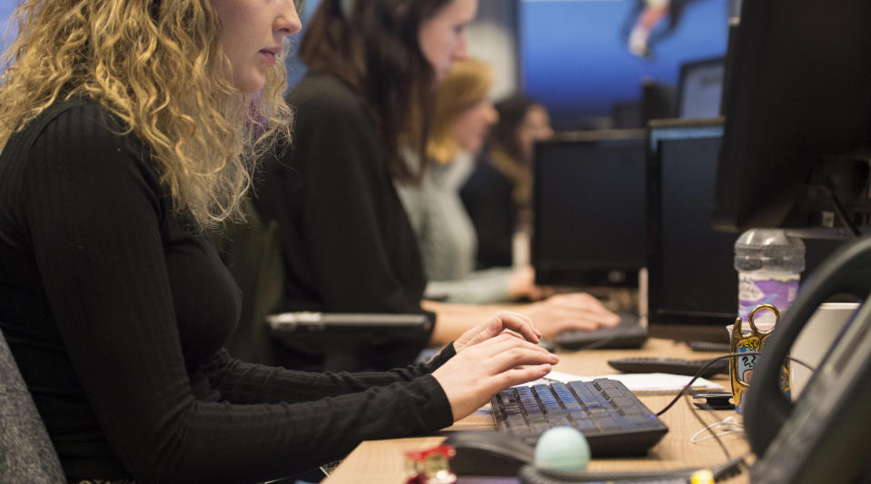 Embargoed to 0001 Thursday April 09 File photo dated 07/01/16 of office workers at their desks. Around half of workers fear they will lose their jobs or be forced to accept a lower salary because of the Covid-19 pandemic, a new study suggests.