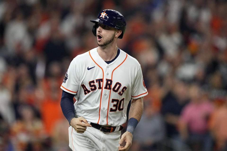 FILE - Houston Astros' Kyle Tucker celebrates his home during the second inning in Game 1 of baseball's World Series against the Philadelphia Phillies on Oct. 28, 2022, in Houston. Tucker went to salary arbitration with the World Series champion Astros on Wednesday, Feb. 8, 2023, asking for $7.5 million rather than the team's $5 million offer. (AP Photo/David J. Phillip, FIle)