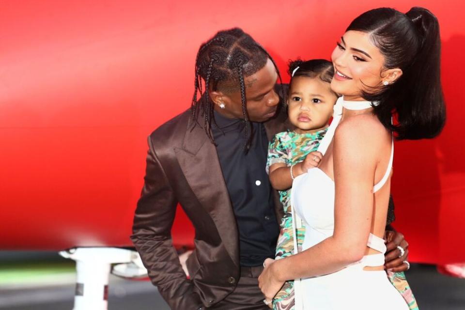 Travis Scott, Kylie Jenner and daughter Stormi | Tommaso Boddi/Getty