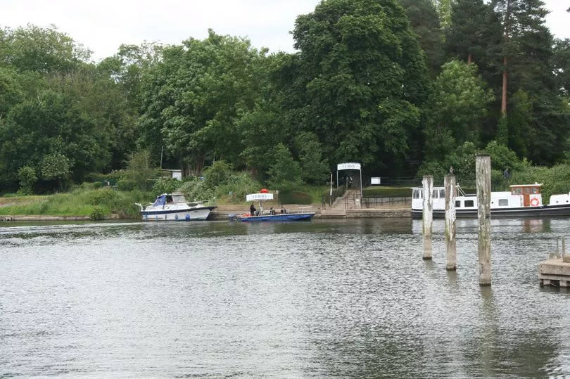 The boat on the other side of the river