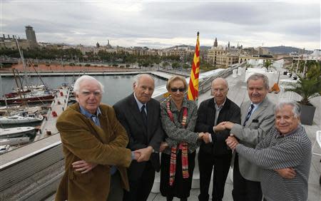 (L-R) Six pro-independence senior citizens Jaume Sobreques, Albert Roma, Nati Gabriel, Paco Vallespi, Florenci Trullas and Tomas Llusera pose on the roof of the Catalonia History Museum in Barcelona November 5, 2013. REUTERS/Gustau Nacarino