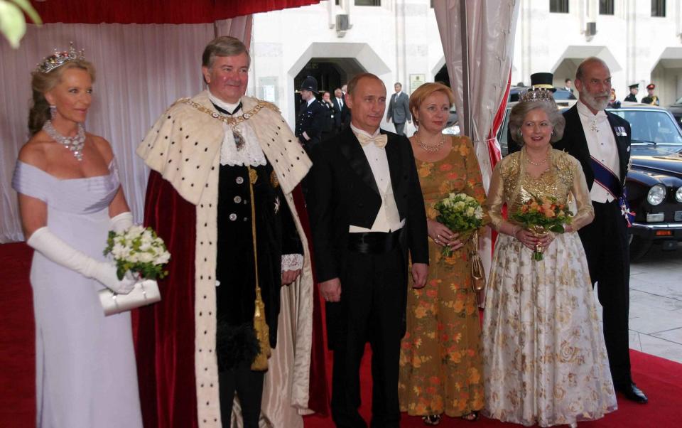 Prince Michael of Kent pictured with Vladimir Putin in 2003, during an official reception at London's City Hall - Ian Jones/PA