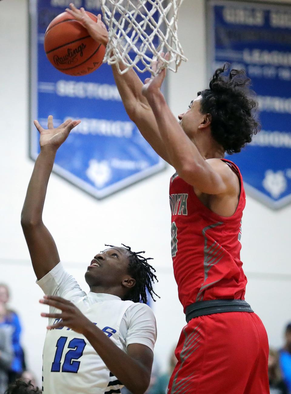 CVCA's Luke McQuillen, left, has a shot blocked by Canton South's Julius Kimbrough during the second half, Friday, Dec. 15, 2023.