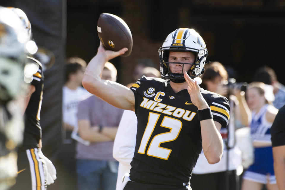 Missouri quarterback Brady Cook warms up before the start of an NCAA college football game against Middle Tennessee, Saturday, Sept. 9, 2023, in Columbia, Mo. (AP Photo/L.G. Patterson)