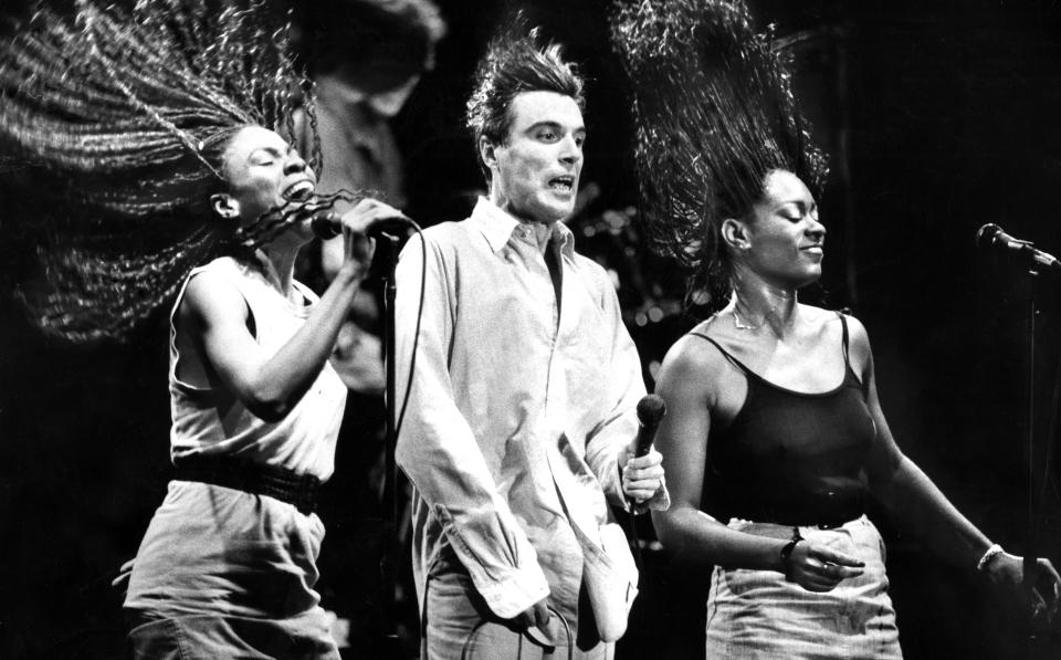 Dec. 7, 1983: The Talking Heads, including David Byrne (center) perform "Burning Down the House" at the Civic Auditorium in San Francisco.