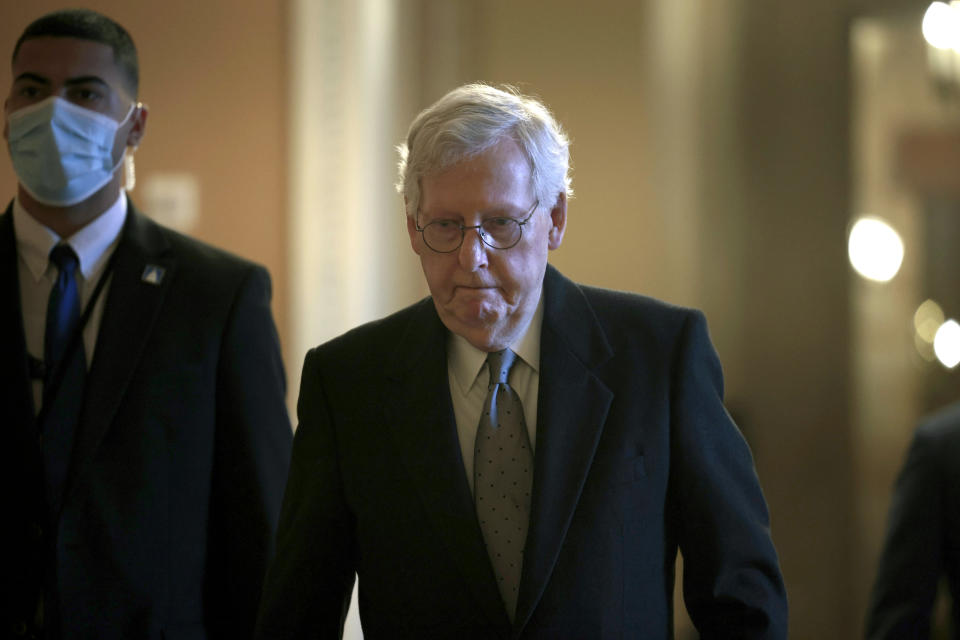 Senate Minority Leader Mitch McConnell, R-Ky., walks to the Senate chamber in the U.S. Capitol.