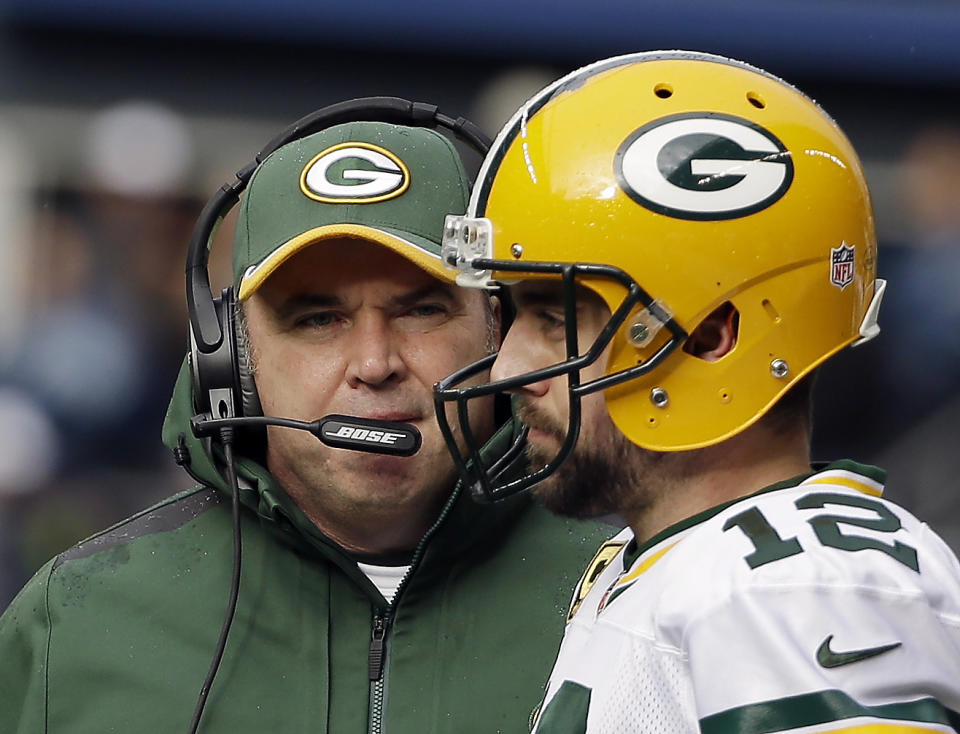FILE - Green Bay Packers head coach Mike McCarthy talks to quarterback Aaron Rodgers (12) during the first half of the NFL football NFC Championship game against the Seattle Seahawks in Seattle, Jan. 18, 2015. Rodgers won his lone Super Bowl title with Mike McCarthy as his coach before their relationship eventually soured. (AP Photo/David J. Phillip, File)