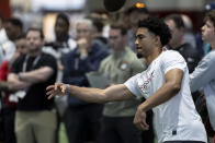 Former Alabama football quarterback Bryce Young works in position drills at Alabama's NFL pro day, Thursday, March 23, 2023, in Tuscaloosa, Ala. (AP Photo/Vasha Hunt)