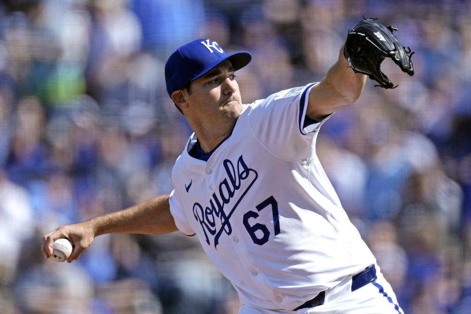 Kansas City Royals starting pitcher Seth Lugo throws during the first inning of a baseball game against the Kansas City Royals Saturday, March 30, 2024, in Kansas City, Mo. (AP Photo/Charlie Riedel)