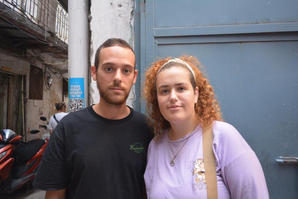 Danielle Alarme (left) and Achana Chasnao cut short their six-month-long trip to India to return to Israel (Namita Singh/The Independent)