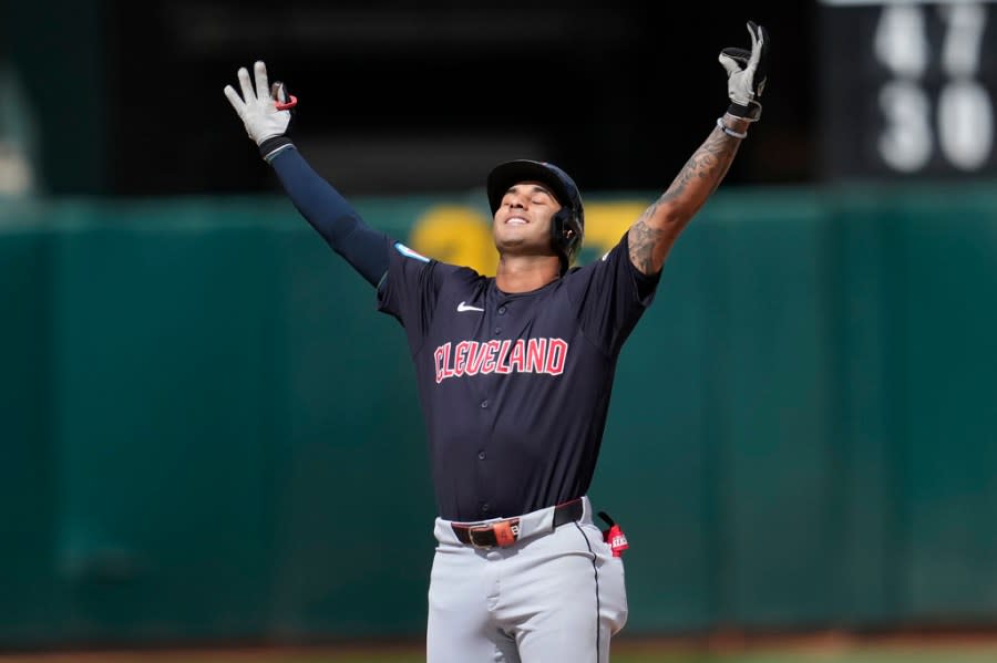 Cleveland Guardians’ Brayan Rocchio gestures after hitting a double against the Oakland Athletics during the fourth inning of a baseball game in Oakland, Calif., Saturday, March 30, 2024. (AP Photo/Jeff Chiu)