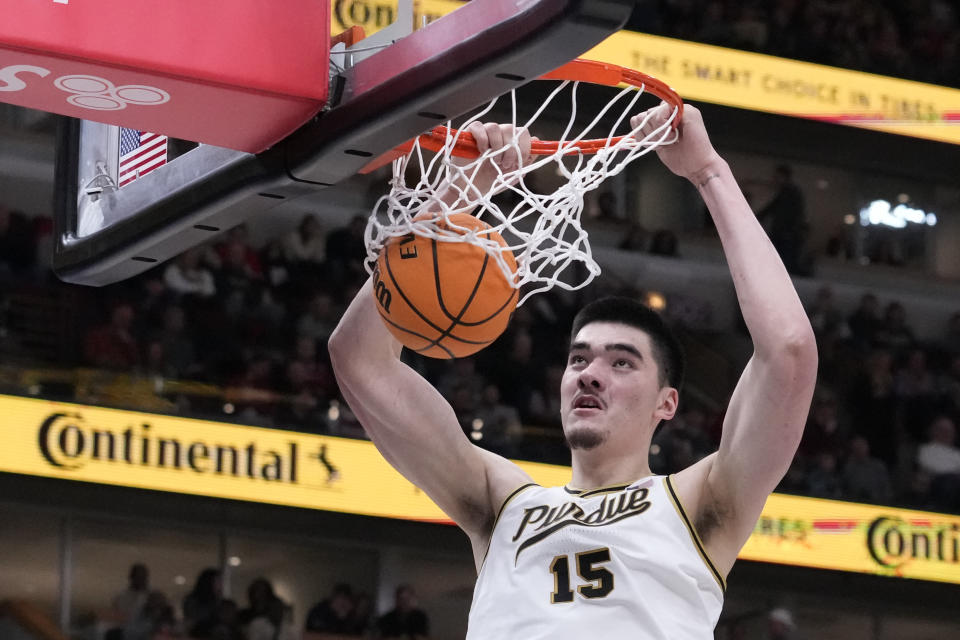 Purdue's Zach Edey dunks during the second half of an NCAA semifinal basketball game against Ohio State at the Big Ten men's tournament, Saturday, March 11, 2023, in Chicago. (AP Photo/Charles Rex Arbogast)