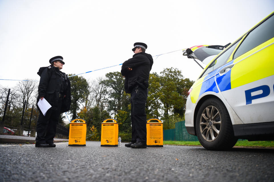 Police officers at the scene on Russell Way in Crawley, West Sussex, after a 24-year-old man was fatally stabbed on Tuesday night.