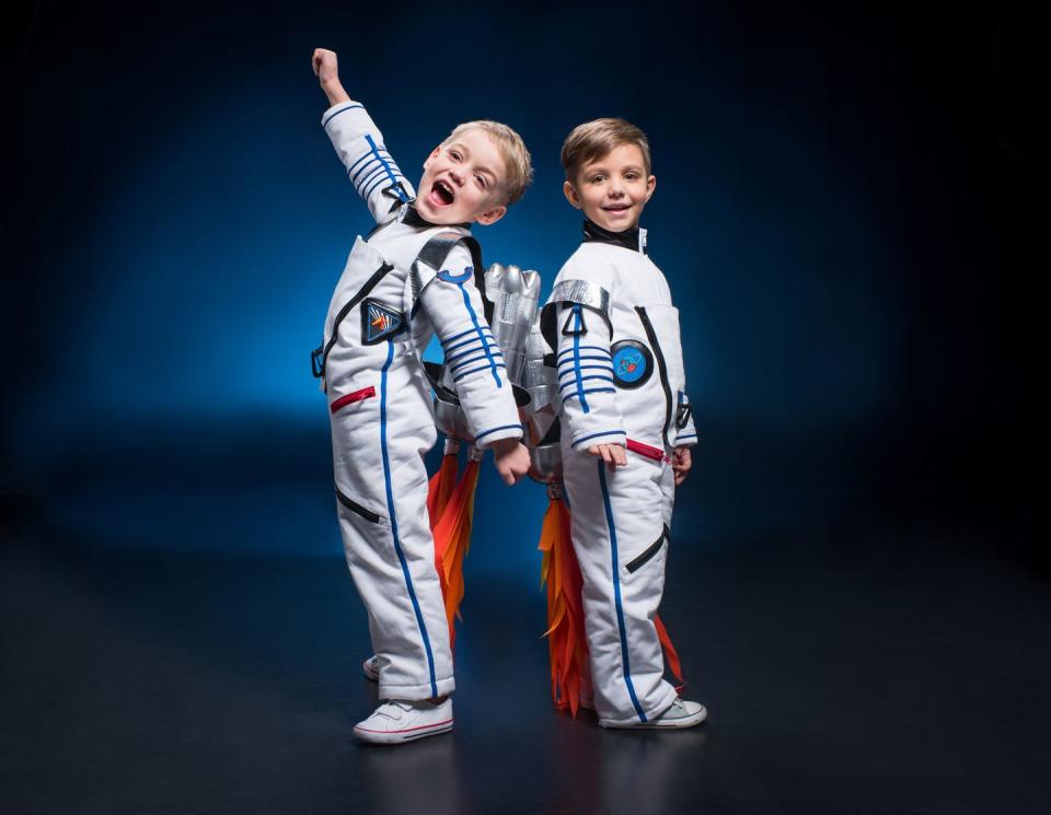 <p>Take them to infinity and beyond by dressing them in matching spacesuits. Don't forget to strap a faux jetpack to their backs, so they can really soar! </p><p><a class="link " href="https://www.amazon.com/Astronaut-Toddlers-Classroom-Performance-Halloween/?tag=syn-yahoo-20&ascsubtag=%5Bartid%7C10055.g.33417241%5Bsrc%7Cyahoo-us" rel="nofollow noopener" target="_blank" data-ylk="slk:SHOP ASTRONAUT COSTUMES;elm:context_link;itc:0;sec:content-canvas">SHOP ASTRONAUT COSTUMES</a><strong><br></strong></p><p><strong>RELATED: </strong><a href="https://www.goodhousekeeping.com/holidays/halloween-ideas/g21729416/toddler-halloween-costumes/" rel="nofollow noopener" target="_blank" data-ylk="slk:The Cutest Halloween Costumes for Toddlers;elm:context_link;itc:0;sec:content-canvas" class="link ">The Cutest Halloween Costumes for Toddlers </a></p>