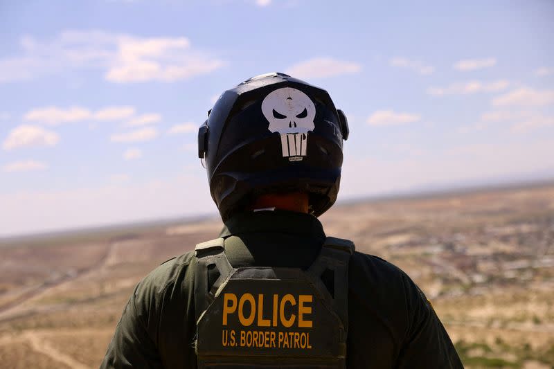 FILE PHOTO: As temperatures rise, desert trek across U.S.-Mexico border becomes more perilous for migrants