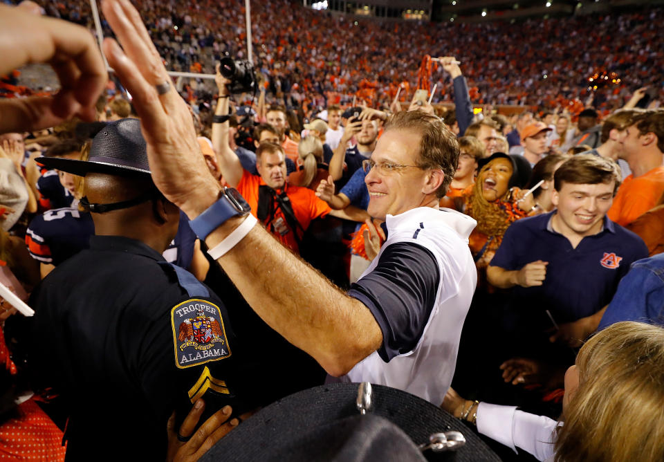 AUBURN, ALABAMA - NOVEMBER 30:  Head coach Gus Malzahn of the Auburn Tigers celebrates their 48-45 win over the Alabama Crimson Tide at Jordan Hare Stadium on November 30, 2019 in Auburn, Alabama. (Photo by Kevin C. Cox/Getty Images)