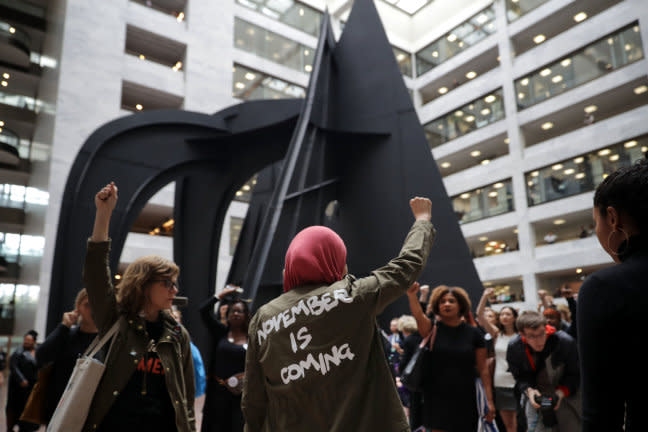 WASHINGTON, DC - SEPTEMBER 24: Hundreds of protesters rally in the Hart Senate Office Building while demonstrating against the confirmation of Supreme Court nominee Judge Brett Kavanaugh on Capitol Hill September 24, 2018 in Washington, DC. Hundreds of people from half a dozen progressive organizations, including students from Yale University Law School, protested on Capitol Hill for a #BelieveSurvivors Walkout against Judge Kavanaugh, who has been accused by at least two women of sexual assault. (Photo by Chip Somodevilla/Getty Images)