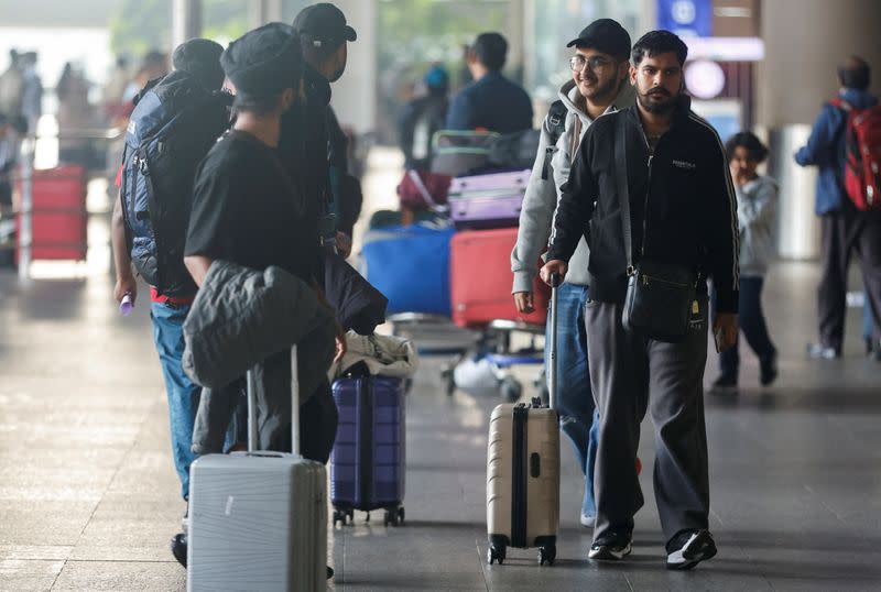 Passengers from Nicaragua bound Airbus A340 flight that was grounded in France on suspicion of human trafficking, leave the Chhatrapati Shivaji Maharaj International Airport in Mumbai