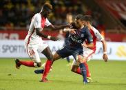 Football Soccer - Monaco v Paris St Germain - French Ligue 1 - Louis II stadium, 28/08/16. Paris St Germain's Hatem Ben Arfa (C) in action with Monaco's Tiemoue Bakayoko. REUTERS/Eric Gaillard