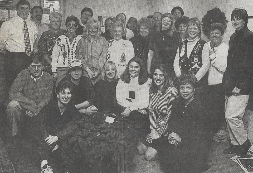 This is a staff photo of the Community Press west office staff.