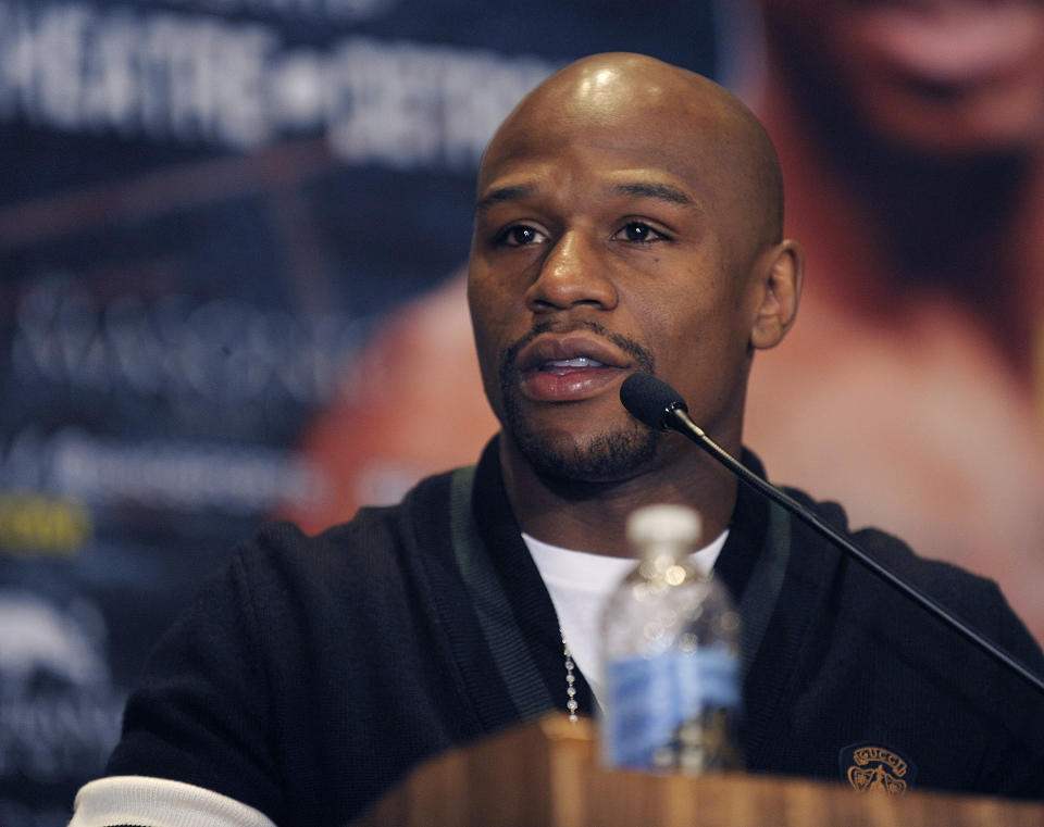 Floyd Mayweather Jr. speaks during a news conference Thursday, Feb. 21, 2013, in Detroit. Mayweather said he is excited about both a weekend fight he's promoting as well as his lucrative new deal with Showtime. Mayweather, who was in Detroit for a news conference ahead of Saturday's junior middleweight title bout between Cornelius Bundrage and Ishe Smith, likened his Showtime agreement to a matrimonial modification. (AP Photo/The Detroit News, Clarence Tabb Jr.) DETROIT FREE PRESS OUT HUFFINGTON POST OUT MAGS OUT