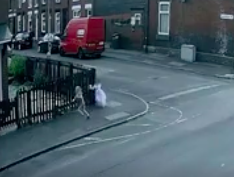 Two young girls - one wearing a princess dress - were also spotted on camera playing near where the shooting took place. (Reach)