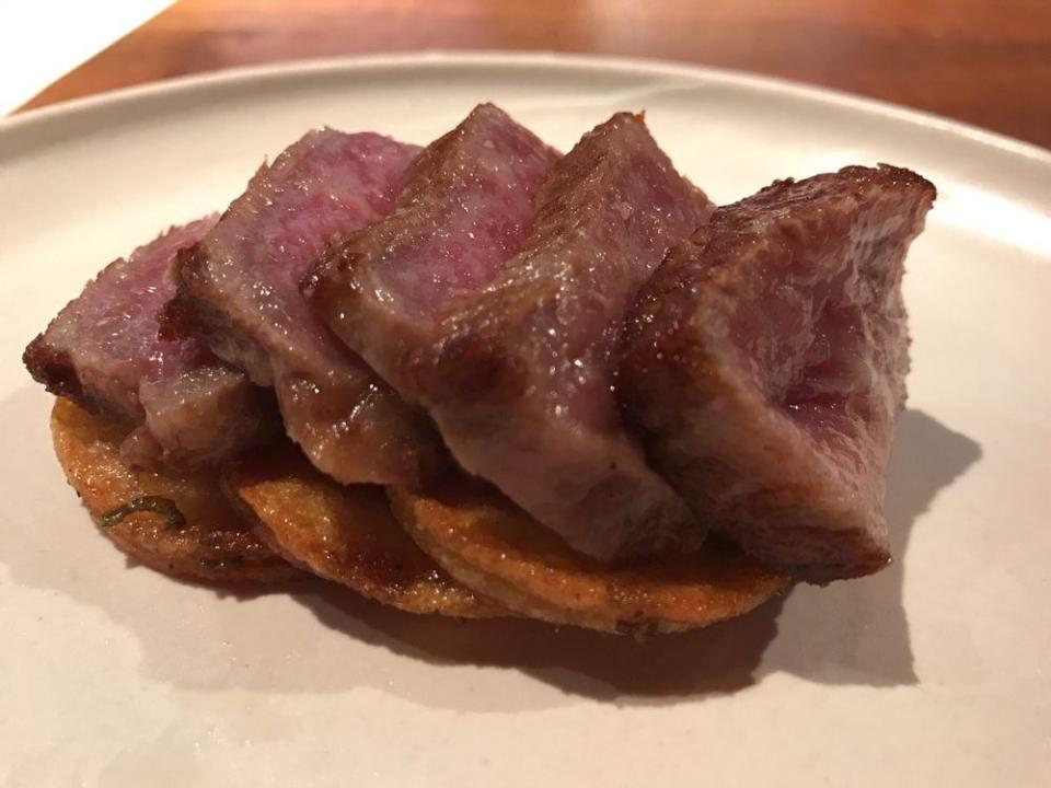 <p>It doesn’t get better than A5 wagyu, and <a href="https://www.tripadvisor.com/Restaurant_Review-g60745-d802390-Reviews-O_Ya-Boston_Massachusetts.html" rel="nofollow noopener" target="_blank" data-ylk="slk:O Ya;elm:context_link;itc:0;sec:content-canvas" class="link ">O Ya</a> in Boston serves this eight-ounce cut of meat with truffle fries and fresh wasabi. If $280 is a bit of a splurge, opt for the two-ounce option that's available for a mere $70. </p>