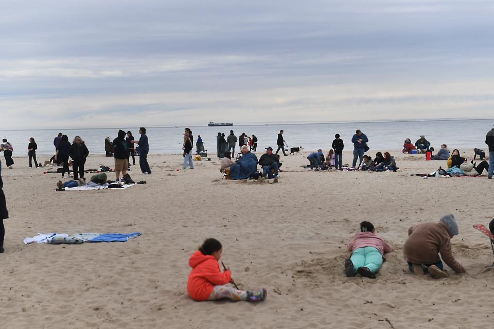 Rochester is in path of totality for the 2024 total solar eclipse. Thousands of sky watchers are expected in the greater Rochester area on April 8, 2024 to see the event. Onlookers react to the start of total solar eclipse at the beach area near the William A. Johnson Jr., Terminal area. This is minutes before the event started.