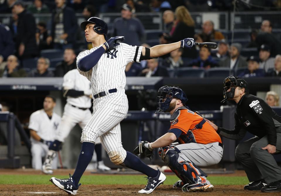 Aaron Judge hits a home run during the seventh inning of Game 4 of the ALCS. (AP)