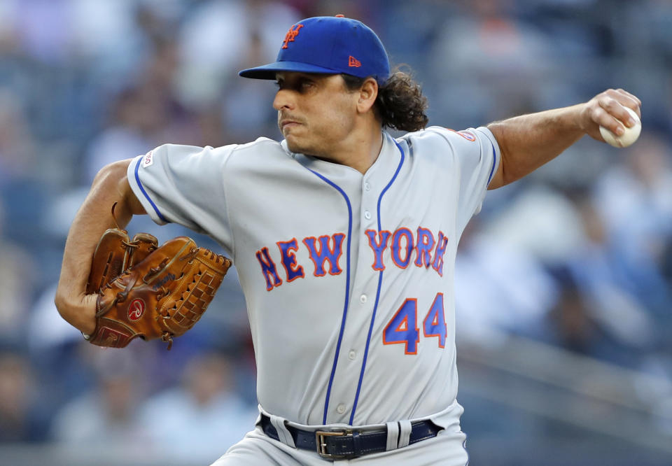 New York Mets starting pitcher Jason Vargas winds up during the first inning of the team's baseball game against the New York Yankees, Tuesday, June 11, 2019, in New York. (AP Photo/Kathy Willens)