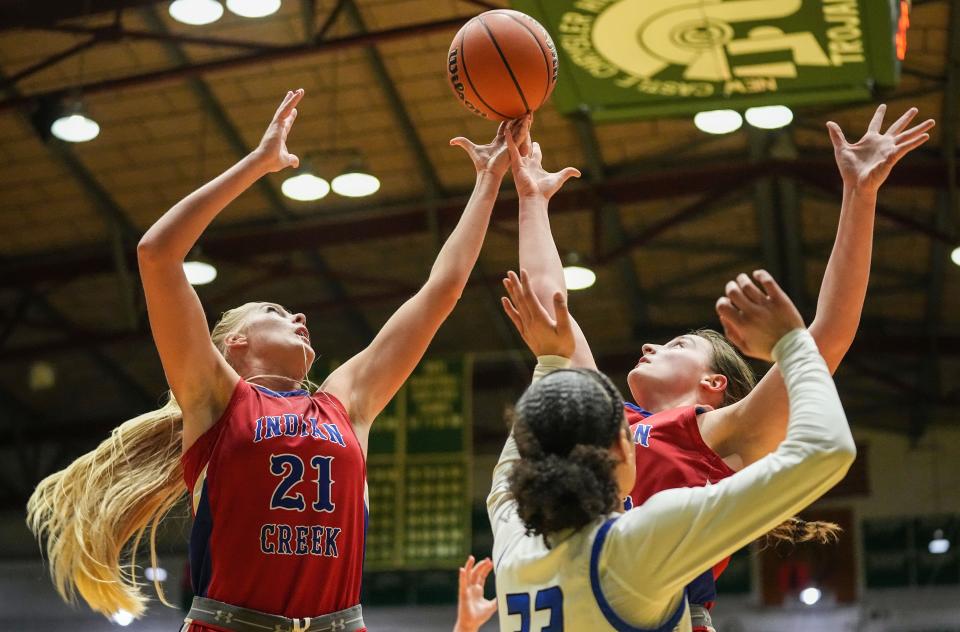 Indian Creek's Faith Wiseman (21) reaches for the ball Thursday, Oct. 5, 2023, during the Hall of Fame Classic girls basketball tournament at New Castle Fieldhouse in New Castle. Lake Central defeated Indian Creek, 51-45.