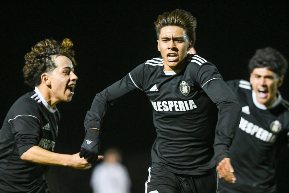 Hesperia's Brandon Zavala celebrates after giving his team a 1-0 lead over Corona in the first round of the CIF-Southern Section Division 3 playoffs Friday, Feb. 11, 2022.