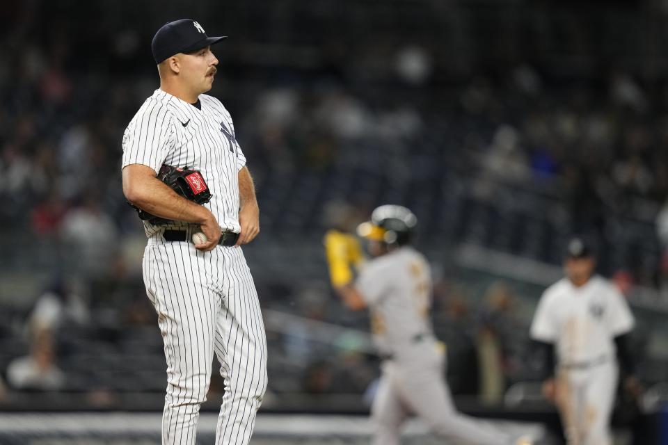 New York Yankees relief pitcher Greg Weissert waits as Oakland Athletics' Jordan Diaz runs the bases on a two-run home run during the eighth inning of a baseball game Tuesday, May 9, 2023, in New York. (AP Photo/Frank Franklin II)