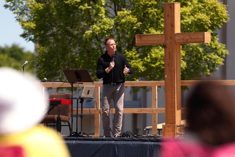 Scott Sheppard, pastor of Cornerstone Church, preaches at an outdoor service n Athens, Ga., on  April 26.