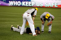 <p>Rep. Tom Rooney (R-FL) lies on the field after a ball hit him in the face during the annual Congressional Baseball Game at Nationals Park in Washington, June 15, 2017. (Photo: Joshua Roberts/Reuters) </p>