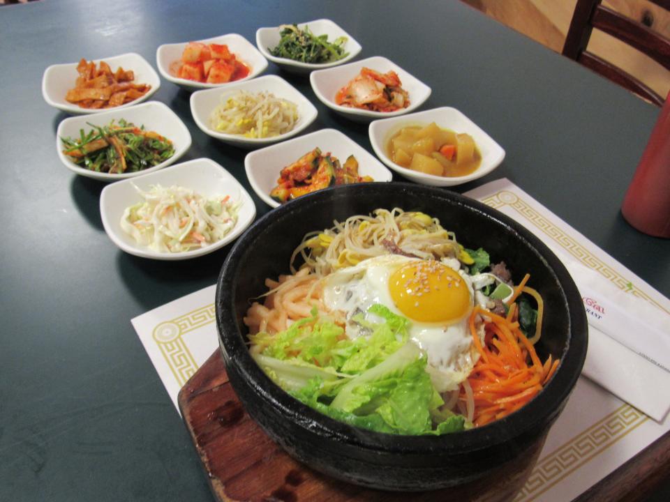 Stone pot bibimbap and banchan (petite sides) at Ming-Ga Korean Restaurant