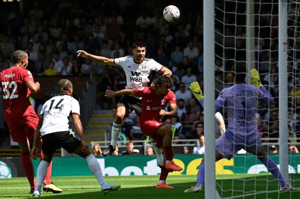 Fulham’s Aleksandar Mitrovic heads home the opening goal (AFP via Getty Images)