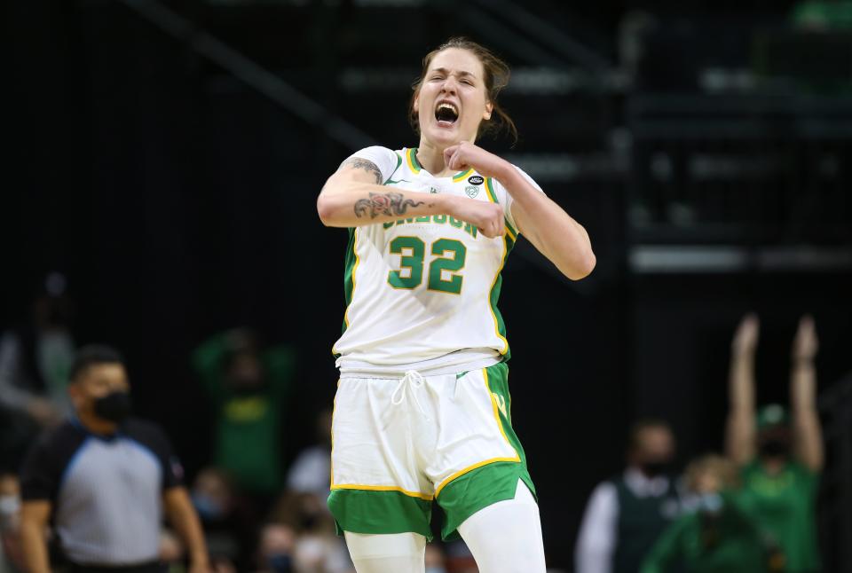 Oregon's Sedona Prince celebrates a turnover against Arizona during overtime in Eugene Saturday Jan. 15, 2022.