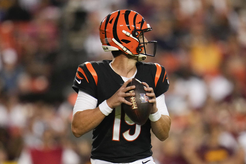 Cincinnati Bengals quarterback Trevor Siemian (19) looking to pass the ball during the second half of an NFL preseason football game against the Washington Commanders, Saturday, Aug. 26, 2023, in Landover, Md. (AP Photo/Julio Cortez)