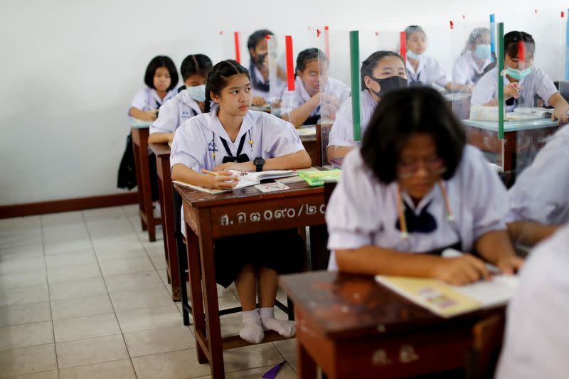 Thai students are seen in a classroom of a school in Bangkok