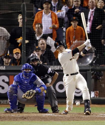 The Giants' Buster Posey went 0-for-4 with an RBI in Game 3. (AP)