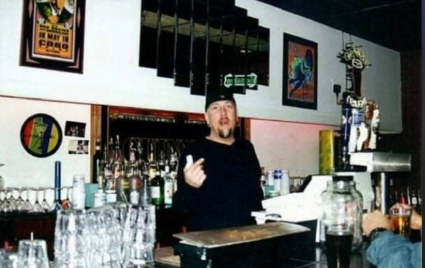 Johnny Gregory behind the bar at The Highlife Martini Lounge at 322 South Ave. Gregory opened Highlife in the late '90s. Highlife sold cigars, high-end cigarettes and signature martinis.