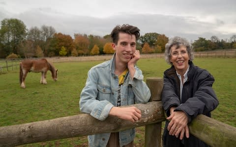 George, pictured with his mum Fran - Credit: Andrew Crowley