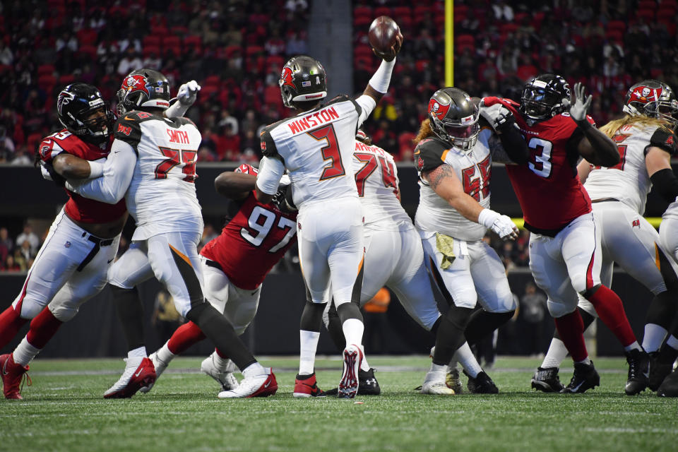 Tampa Bay Buccaneers quarterback Jameis Winston (3) works in the pocket against the Atlanta Falcons during the first half of an NFL football game, Sunday, Nov. 24, 2019, in Atlanta. (AP Photo/John Amis)