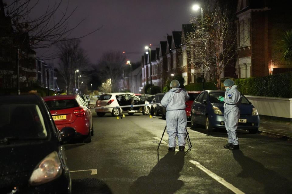 Police at the scene of an incident near Clapham Common (PA)