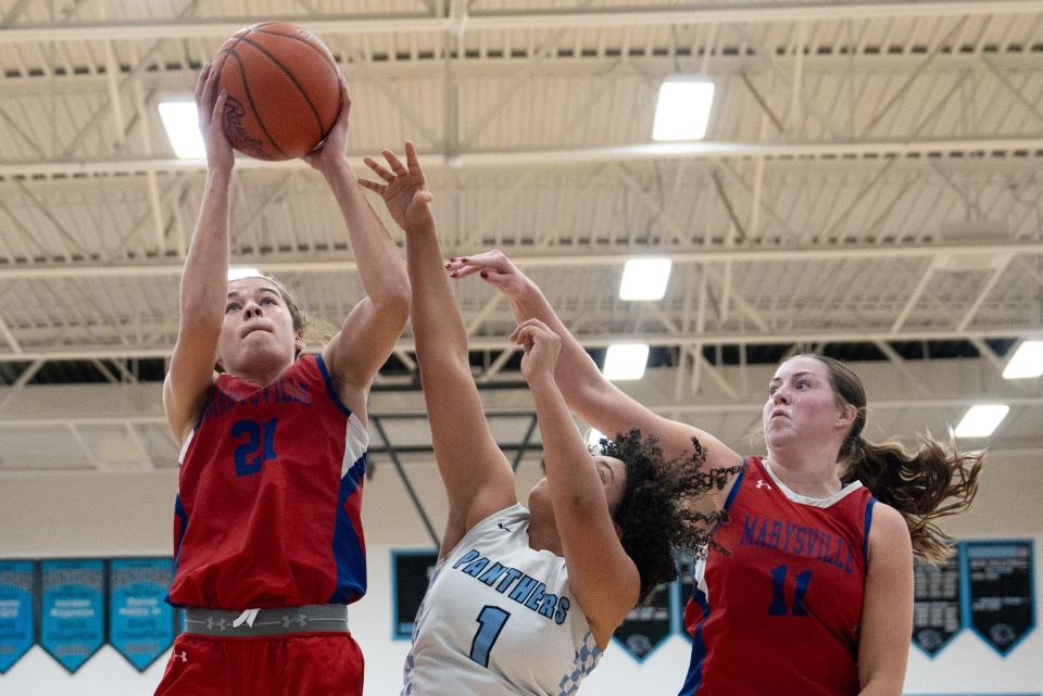 Senior JoJo Eberhart, left, has led Marysville to a 9-1 start. She's averaging 12.3 points, 5.0 rebounds, 4.6 assists and 3.6 steals.