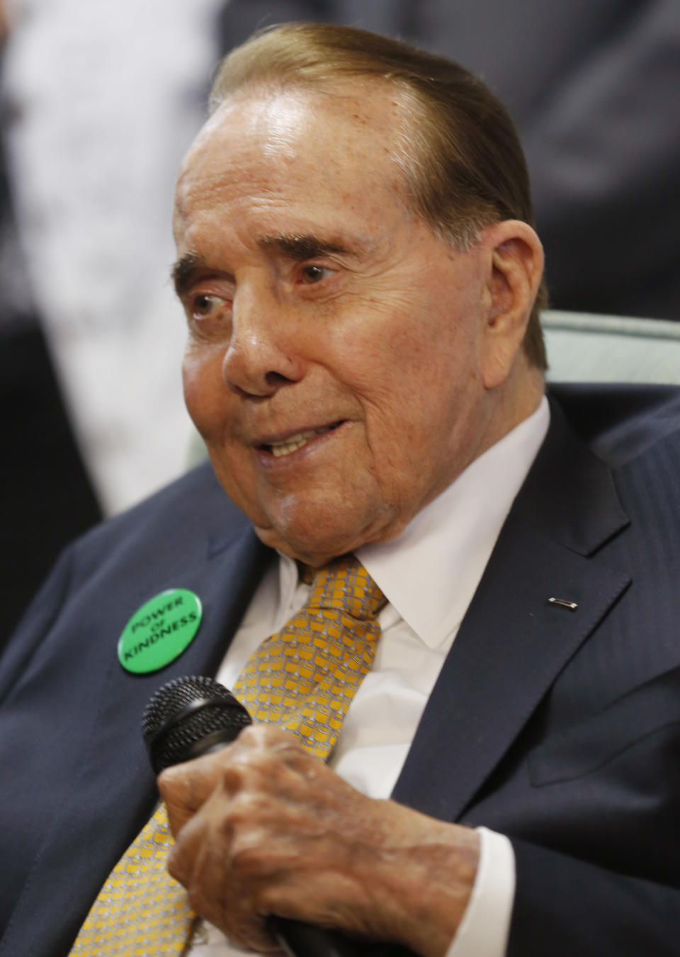 Former Sen. Bob Dole, R-Kan., talks to a crowd gathered at Johnson County Republican Headquarters in Overland Park, Kan., Monday, April 21, 2014. (AP Photo/Orlin Wagner)