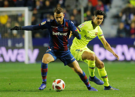 Soccer Football - Copa del Rey - Round of 16 - First Leg - Levante v FC Barcelona - Ciutat de Valencia, Valencia, Spain - January 10, 2019 Levante's Borja Mayoral in action with Barcelona's Juan Brandariz REUTERS/Heino Kalis