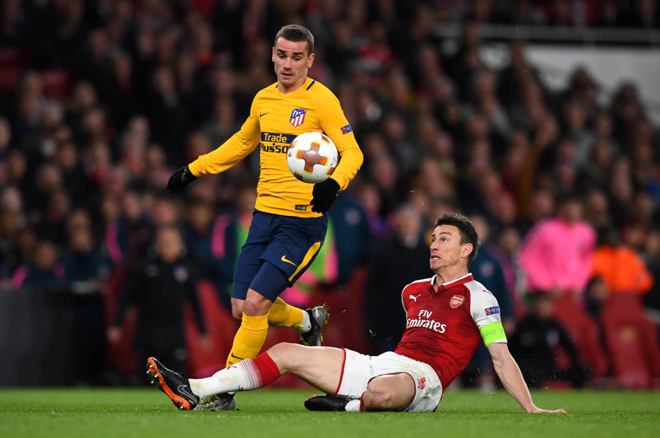 <p>Soccer Football – Europa League Semi Final First Leg – Arsenal vs Atletico Madrid – Emirates Stadium, London, Britain – April 26, 2018 Atletico Madrid’s Antoine Griezmann in action with Arsenal’s Laurent Koscielny before scoring their first goal REUTERS/Dylan Martinez </p>