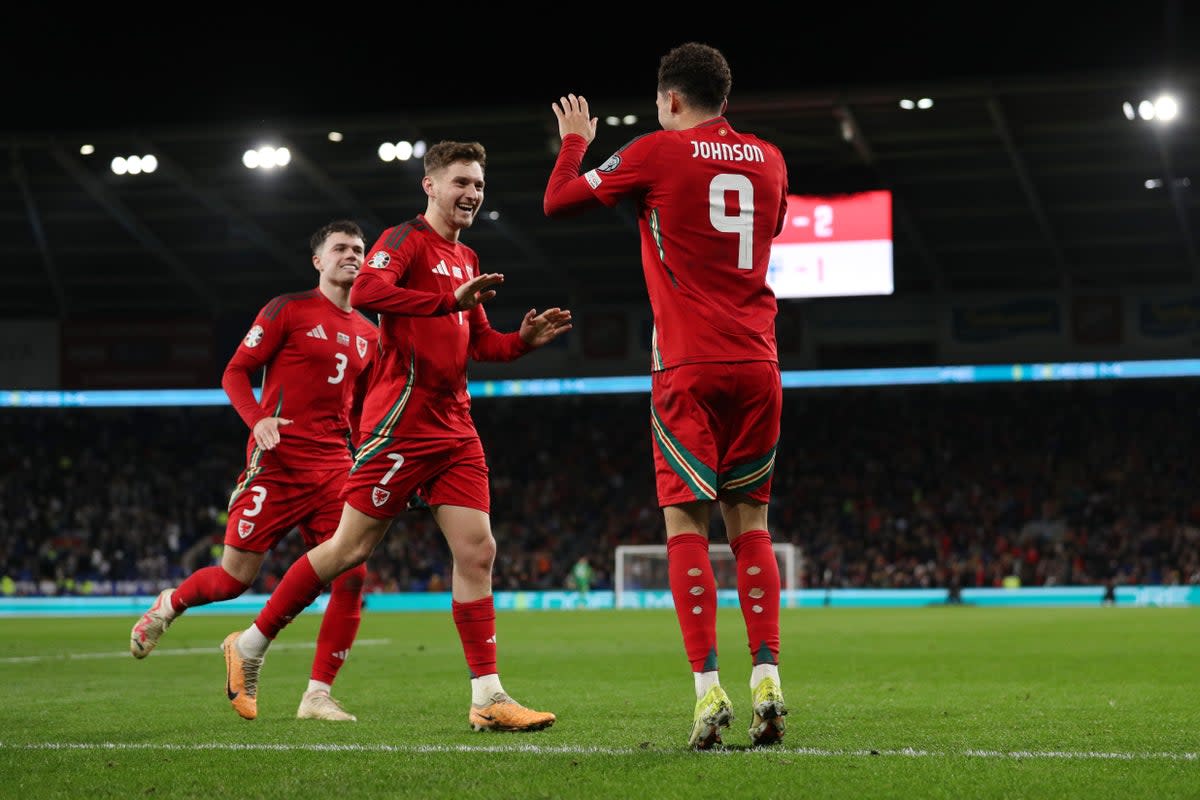 Wales celebrate their third goal of the game (Getty Images)